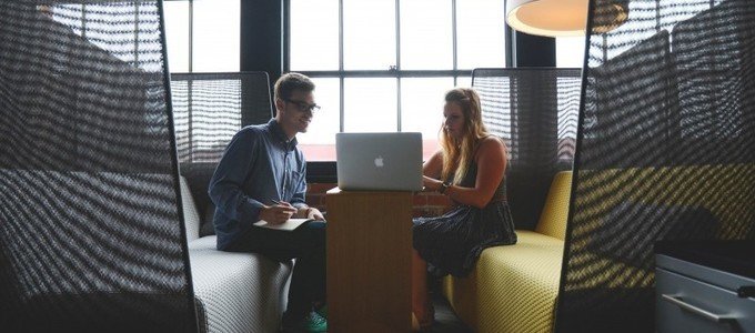 two workers with laptop